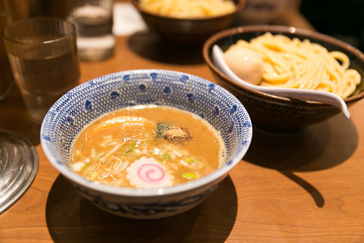 A bowl of Japanese ramen with chashu and spring onion