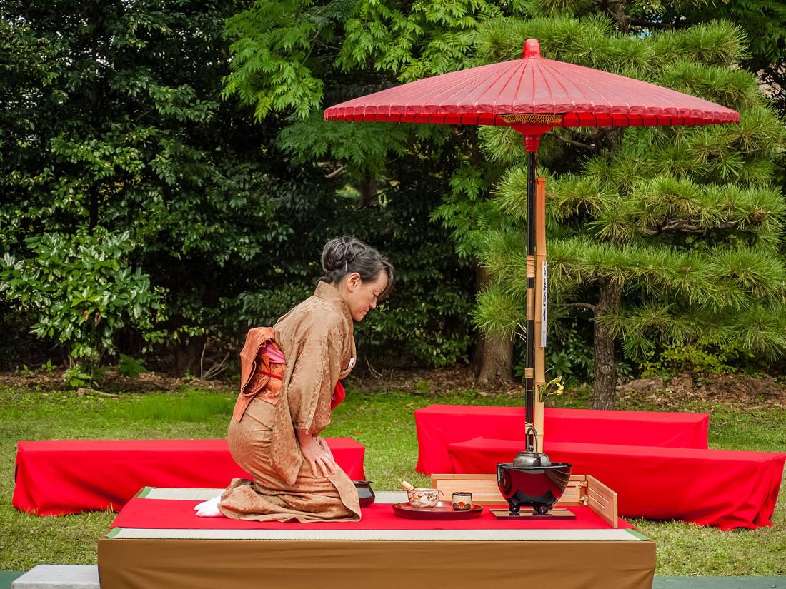 A Japanese tea ceremony with a matcha bowl and whisk